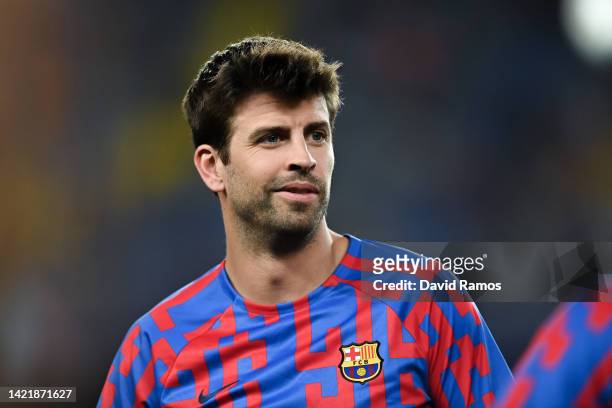Gerard Pique of FC Barcelona looks on during the warm up prior to the UEFA Champions League group C match between FC Barcelona and Viktoria Plzen at...