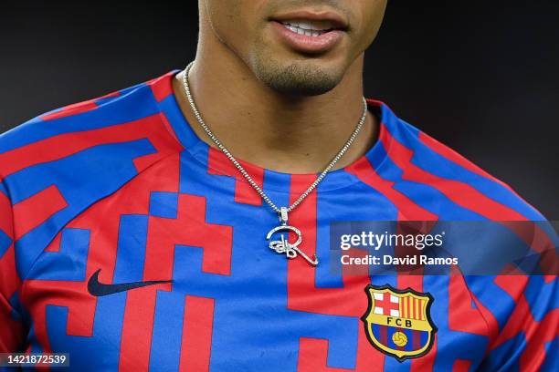 Details of Rafinha of FC Barcelona necklace during the warm up prior to the UEFA Champions League group C match between FC Barcelona and Viktoria...