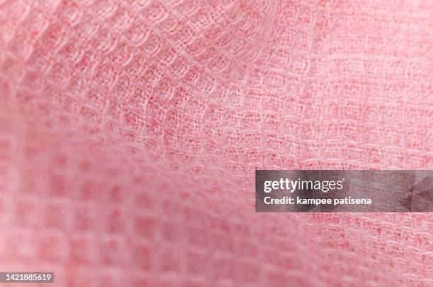 texture of knitted pink fabric. pink background. - pink jersey imagens e fotografias de stock