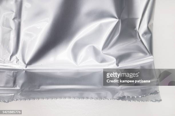 aluminum foil bag - chips bag stockfoto's en -beelden