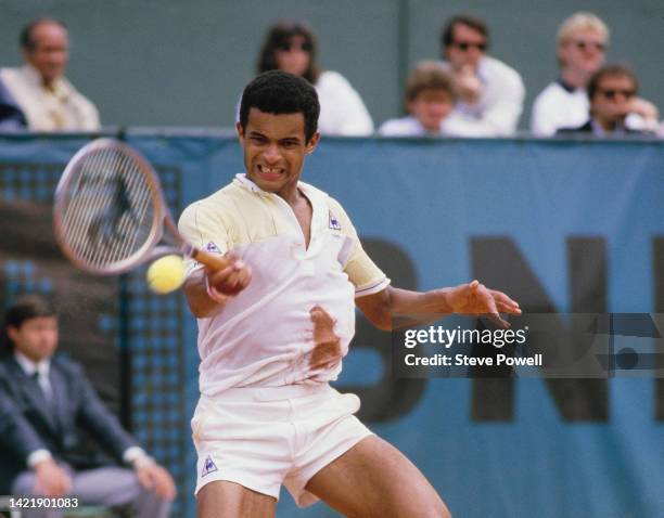 Yannick Noah of France plays a forehand return against Balázs Taróczy of Hungary during their Men's Singles Fourth Round match at the French Open...