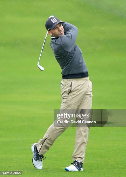 Sergio Garcia of Spain plays his second shot on the fourth hole during the first round of the 2022 BMW PGA Championship at Wentworth Golf Club on...