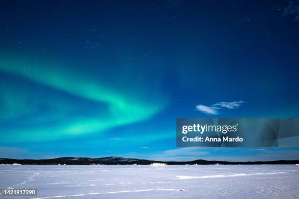 green aurora borealis at lake inari in winter - inari finland bildbanksfoton och bilder
