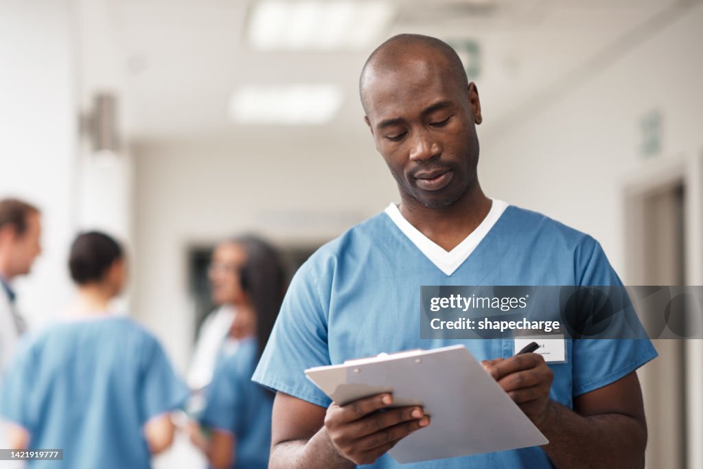 Medical doctor writing on document for insurance, planning schedule with paperwork and doing admin report working as nurse in hospital. Worker giving signature on contract at healthcare clinic