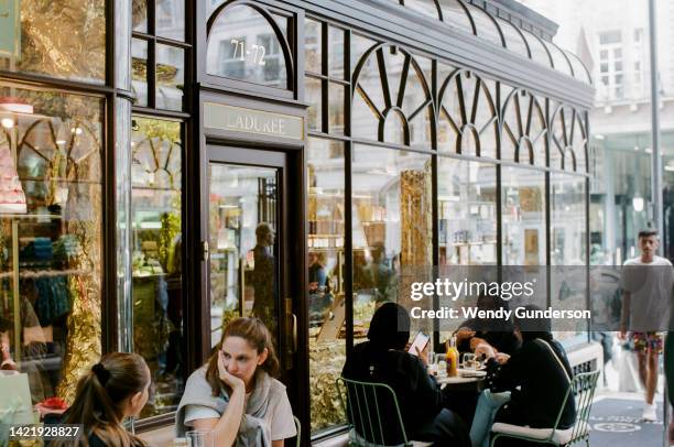 outdoor dining, london - laduree stock pictures, royalty-free photos & images