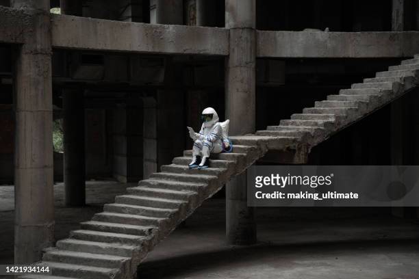 astronaut in ruins - experimental rock stock pictures, royalty-free photos & images