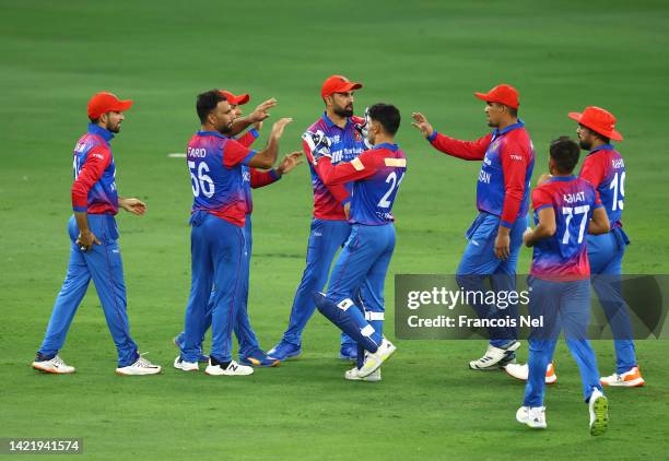 Players of Afghanistan celebrates the wicket of KL Raul of India during the DP World Asia Cup match between India and Afghanistan at Dubai Cricket...