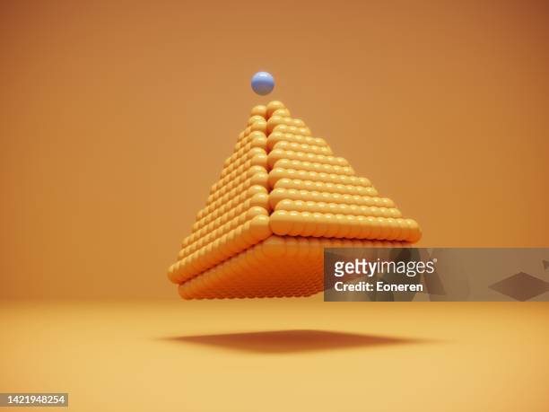 spheres on pyramid shape - 3d pyramid stock pictures, royalty-free photos & images