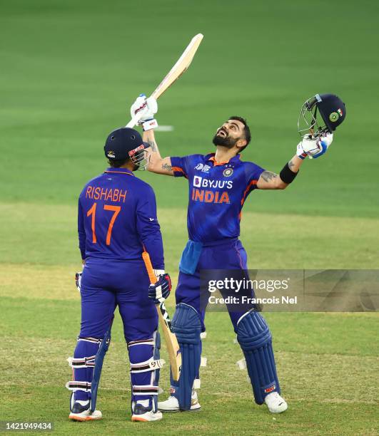 Virat Kohli of India celebrates after reaching his century during the DP World Asia Cup match between India and Afghanistan at Dubai Cricket Stadium...