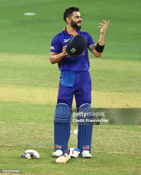 Virat Kohli of India celebrates after reaching his century during the DP World Asia Cup match between India and Afghanistan at Dubai Cricket Stadium...