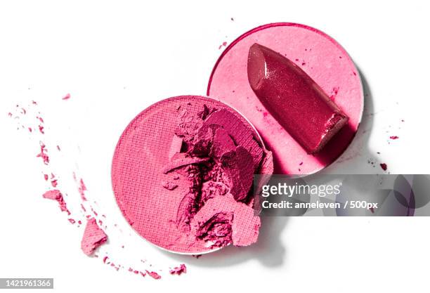 crushed eyeshadows and lipstick isolated on white background - eye shadow stock pictures, royalty-free photos & images