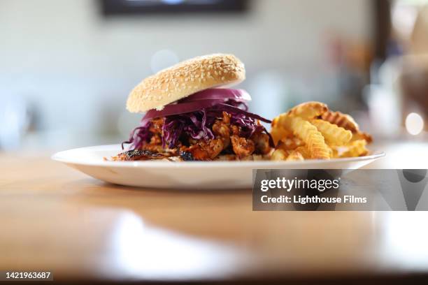 cu tasty chicken barbecue sandwich with fresh ingredients - sesame seed bun stock pictures, royalty-free photos & images