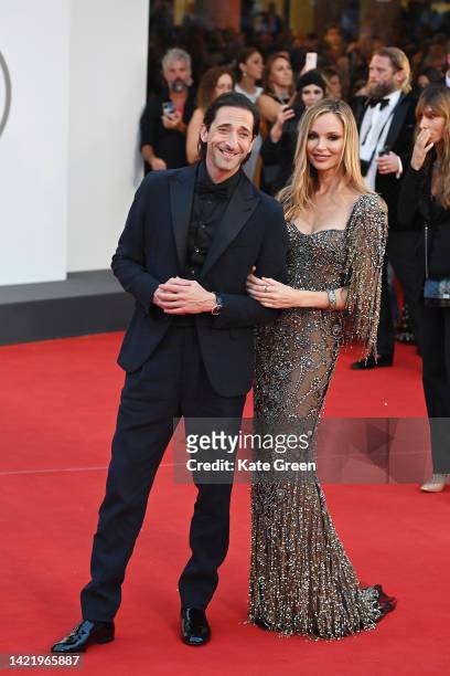 Adrien Brody and Georgina Chapman attend the "Blonde" red carpet at the 79th Venice International Film Festival on September 08, 2022 in Venice,...