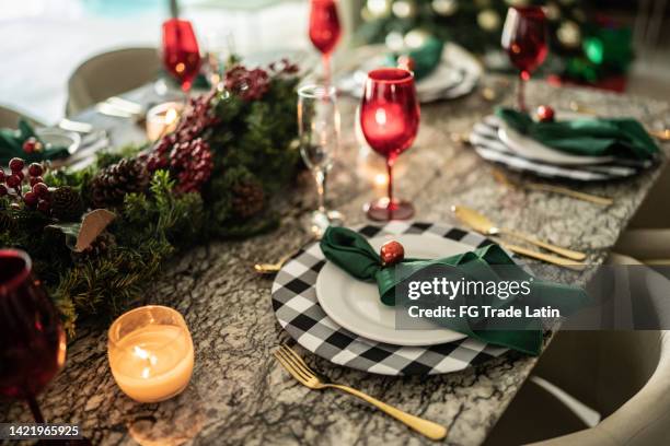 christmas decoration on the dining table at home - napkin ring stock pictures, royalty-free photos & images