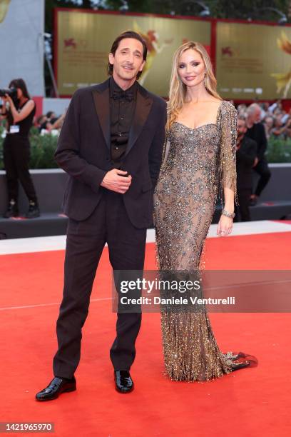 Adrien Brody and Georgina Chapman attend the "Blonde" red carpet at the 79th Venice International Film Festival on September 08, 2022 in Venice,...