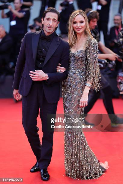 Adrien Brody and Georgina Chapman attend the Netflix Film "Blonde" red carpet at the 79th Venice International Film Festival on September 08, 2022 in...