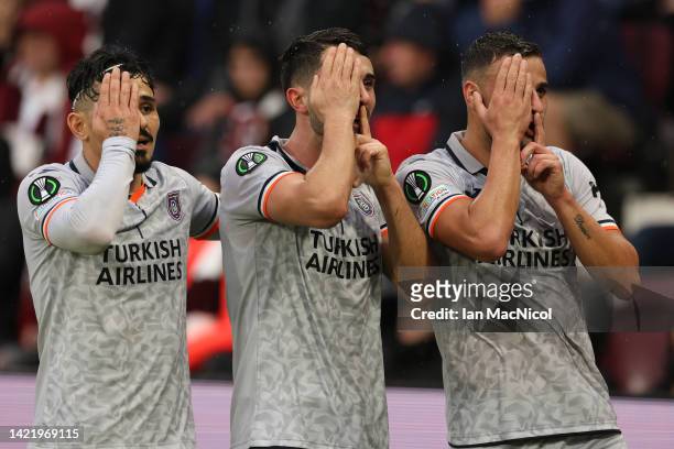 Hasan Ali Kaldırım celebrates with Serdar Guerler and Deniz Tueruec of Istanbul Basaksehir after scoring their team's first goal during the UEFA...