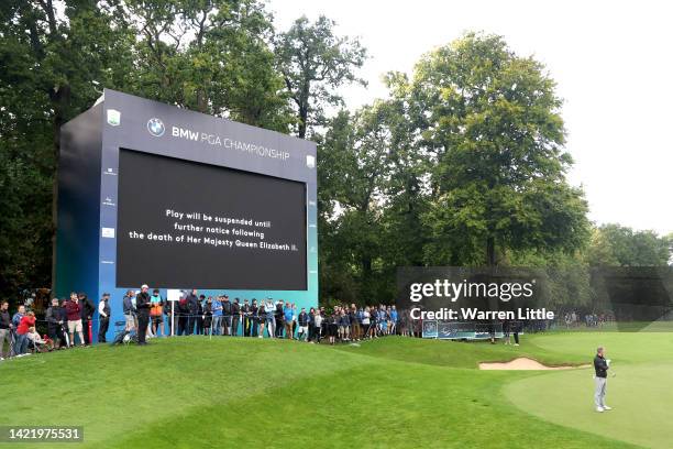 Screen on the 18th green displays the announcement that play is to be suspended following the death of Her Majesty Queen Elizabeth II during Day One...