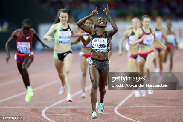 Faith Kipyegon of Kenya celebrates following their victory in Women's 1500 Metres during the Weltklasse Zurich 2022, part of the 2022 Diamond League...