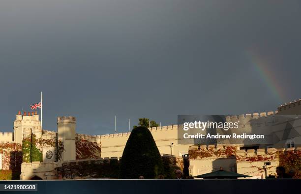 Rainbow is seen as flags are flown at half-mast at the 1st tee following the announcement of the death of Her Majesty Queen Elizabeth II during Day...