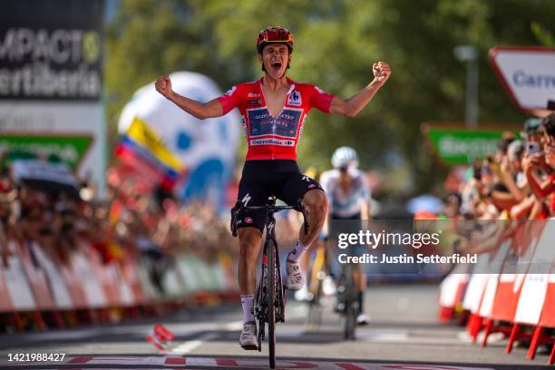 Remco Evenepoel of Belgium and Team Quick-Step - Alpha Vinyl - Red Leader Jersey celebrates winning during the 77th Tour of Spain 2022, Stage 18 a...