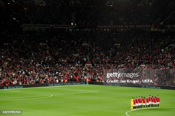 Players of Manchester United observe a minutes silence after it was announced that Queen Elizabeth II has passed away today prior to the UEFA Europa...