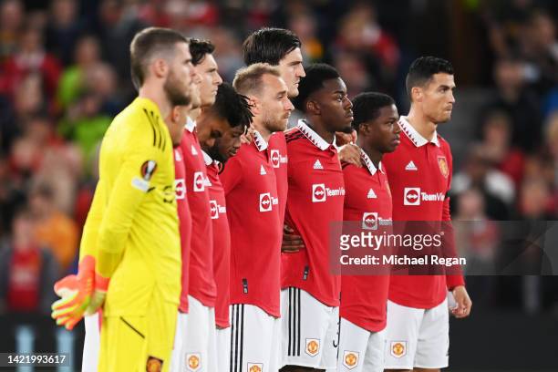 Players of Manchester United observe a minutes silence after it was announced that Queen Elizabeth II has passed away today prior to the UEFA Europa...