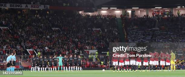The two teams take part in a minute's silence to mark the passing of Queen Elizabeth II ahead of the UEFA Europa League group E match between...