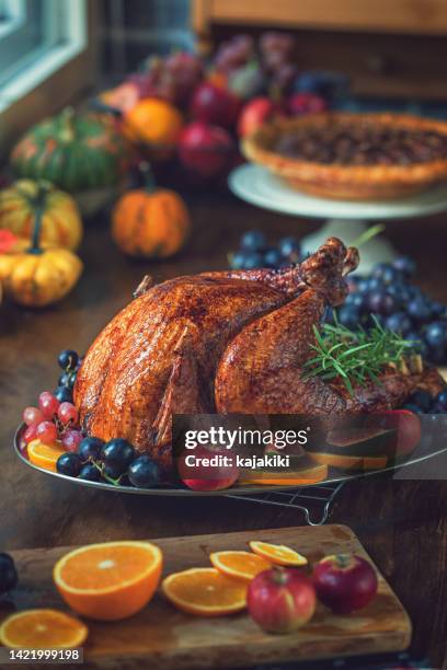 stuffed turkey for thanksgiving holidays - roast turkey stock pictures, royalty-free photos & images