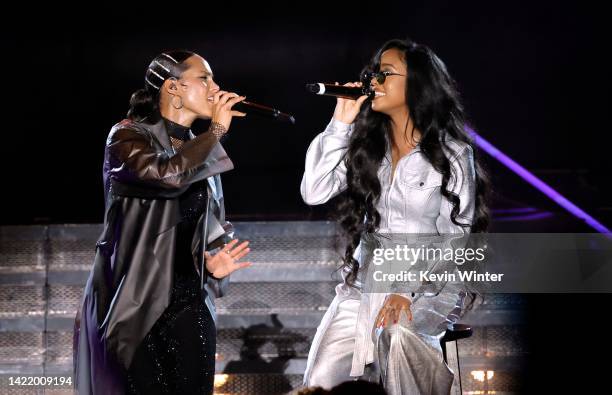 Alicia Keys and H.E.R. Perform onstage at The Greek Theatre on September 07, 2022 in Los Angeles, California.