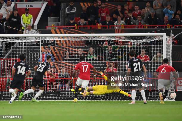 Brais Mendez of Real Sociedad scores their team's first goal from the penalty spot past David de Gea of Manchester United during the UEFA Europa...
