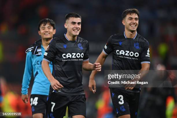 Ander Barrenetxea and Martin Zubimendi of Real Sociedad celebrates victory following the UEFA Europa League group E match between Manchester United...
