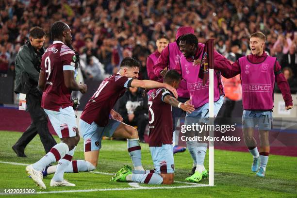 Emerson Palmieri of West Ham United celebrates with teammates after scoring their team's second goal during the UEFA Europa Conference League group B...