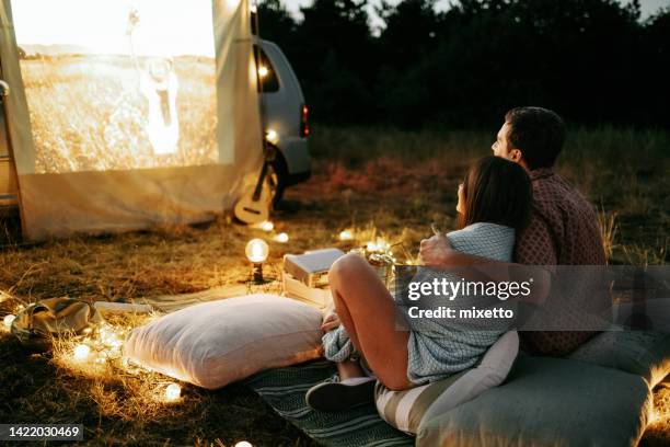 romantic movie night - outdoor cinema stock pictures, royalty-free photos & images