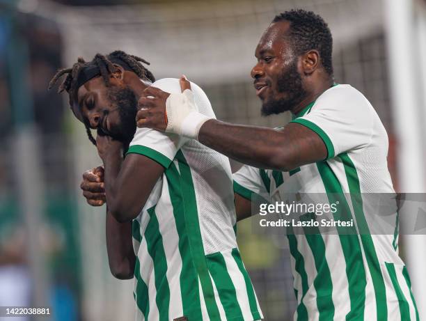 Tokmac Chol Nguen of Ferencvaros celebrates after scoring a goal with Franck Boli of Ferencvaros during the UEFA Europa League group H match between...