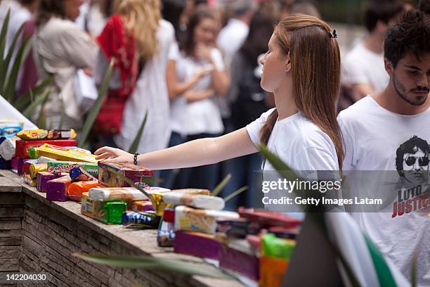 Student leaves cookies during a protest at the Australian embassy against the killing of Brazilian student Roberto Laudisio Curti, on March 31, 2012...