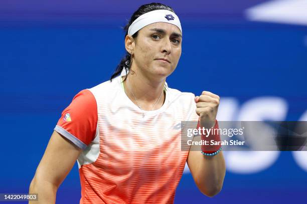 Ons Jabeur of Tunisia celebrates winning the first set against Caroline Garcia of France during their Women’s Singles Semifinal match on Day Eleven...