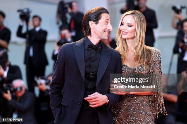 Adrien Brody and Georgina Chapman attend the "Blonde" red carpet at the 79th Venice International Film Festival on September 08, 2022 in Venice,...