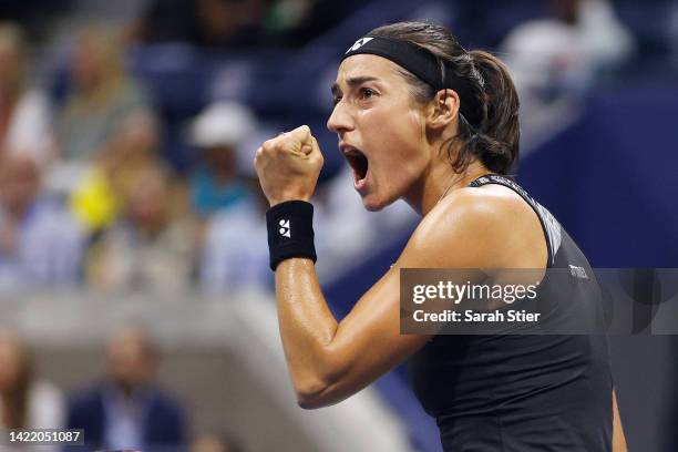 Caroline Garcia of France celebrates winning a game against Ons Jabeur of Tunisia during their Women’s Singles Semifinal match on Day Eleven of the...