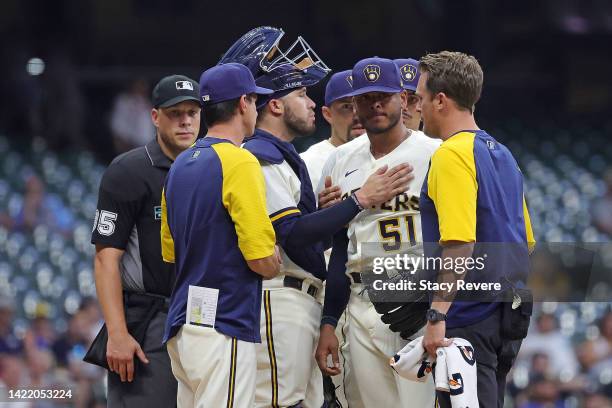 Freddy Peralta of the Milwaukee Brewers leaves the game during the third inning of game two of a doubleheader against the San Francisco Giants at...