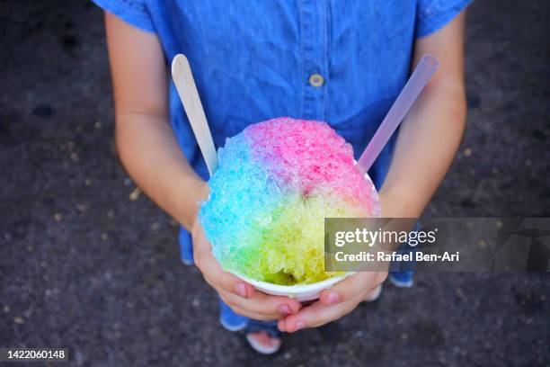 frozen rainbow ice drink - slushy stock-fotos und bilder