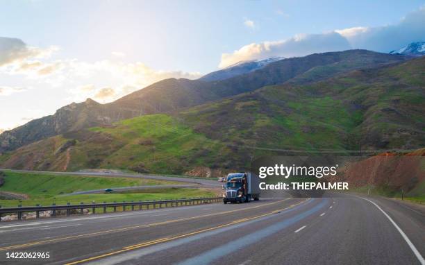 semi-truck driving uphill in utah, usa - driving uphill stock pictures, royalty-free photos & images