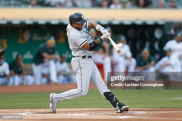 Elvis Andrus of the Chicago White Sox hits a solo home run in the top of the first inning against the Oakland Athletics at RingCentral Coliseum on...