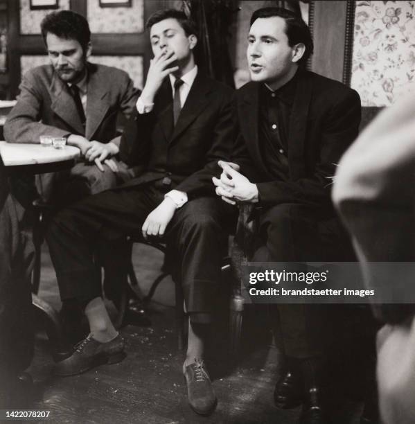 The Austrian writers H. C. Artmann; Konrad Bayer and Gerhard Rühm in Café Hawelka. Vienna 1. 1958. .