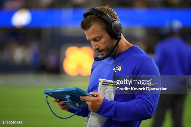 Head coach Sean McVay of the Los Angeles Rams looks at a Microsoft Surface tablet during the second quarter of the NFL game against the Buffalo Bills...