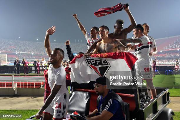 Welington of Sao Paulo and teammates celebrate in a cart as they advance to the final following the win in the penalty shootout after a Copa CONMEBOL...