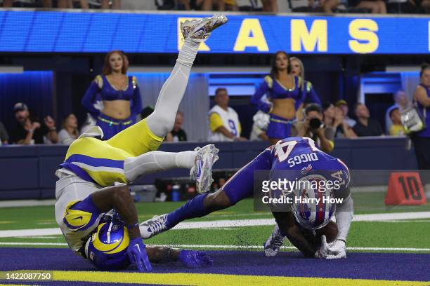 Wide receiver Stefon Diggs of the Buffalo Bills catches a 53-yard touchdown reception against cornerback Jalen Ramsey of the Los Angeles Rams during...