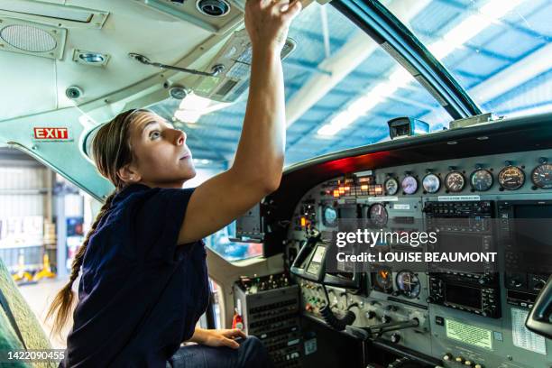 real life young female aircraft engineer apprentice at work - tradeswoman stock pictures, royalty-free photos & images