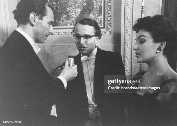 Journalist Heinz Fischer-Karwin with Wolfgang Wagner and Louise Martini at the opening of the Vienna State Opera. 5 November 1955.
