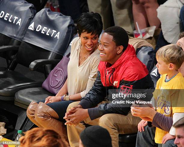 Regina King and her son Ian Alexander Jr. Attend a basketball game between the New Orleans Hornets and the Los Angeles Lakers at Staples Center on...